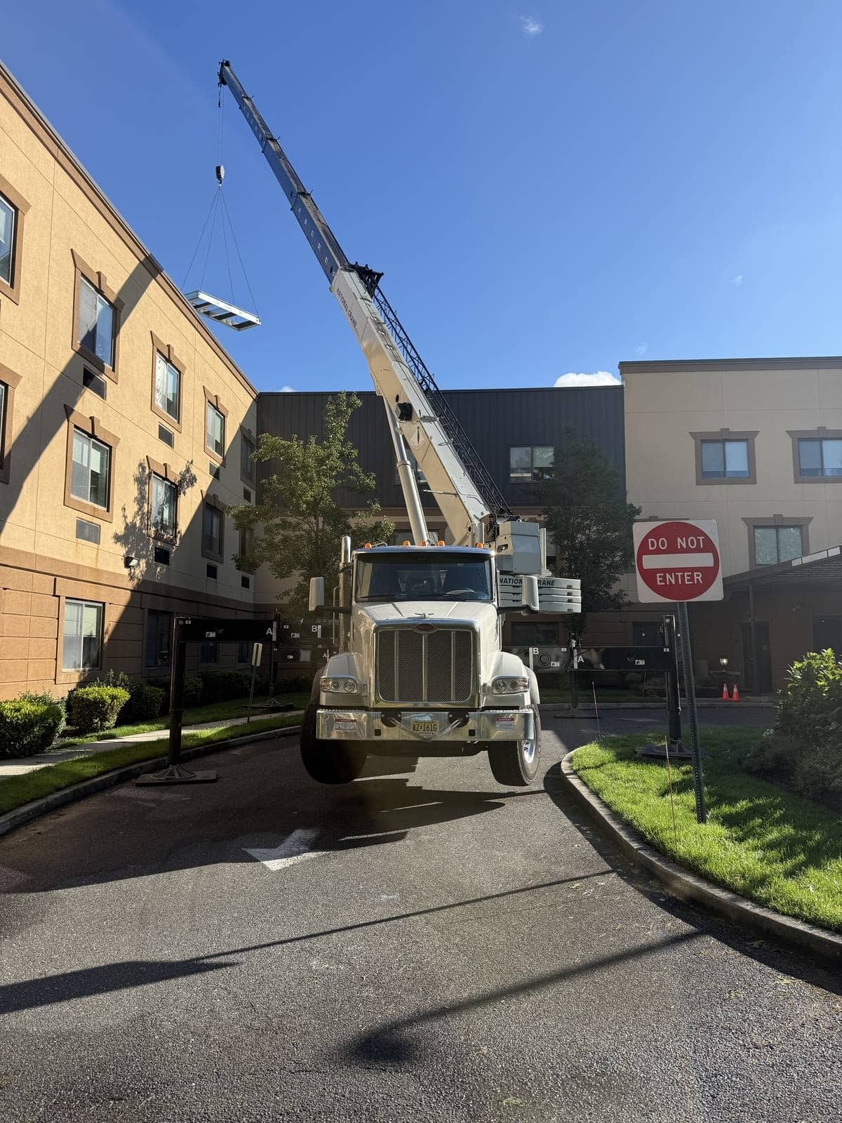 AAON RTU frame on the hook during the lift at a healthcare facility in Galloway, NJ