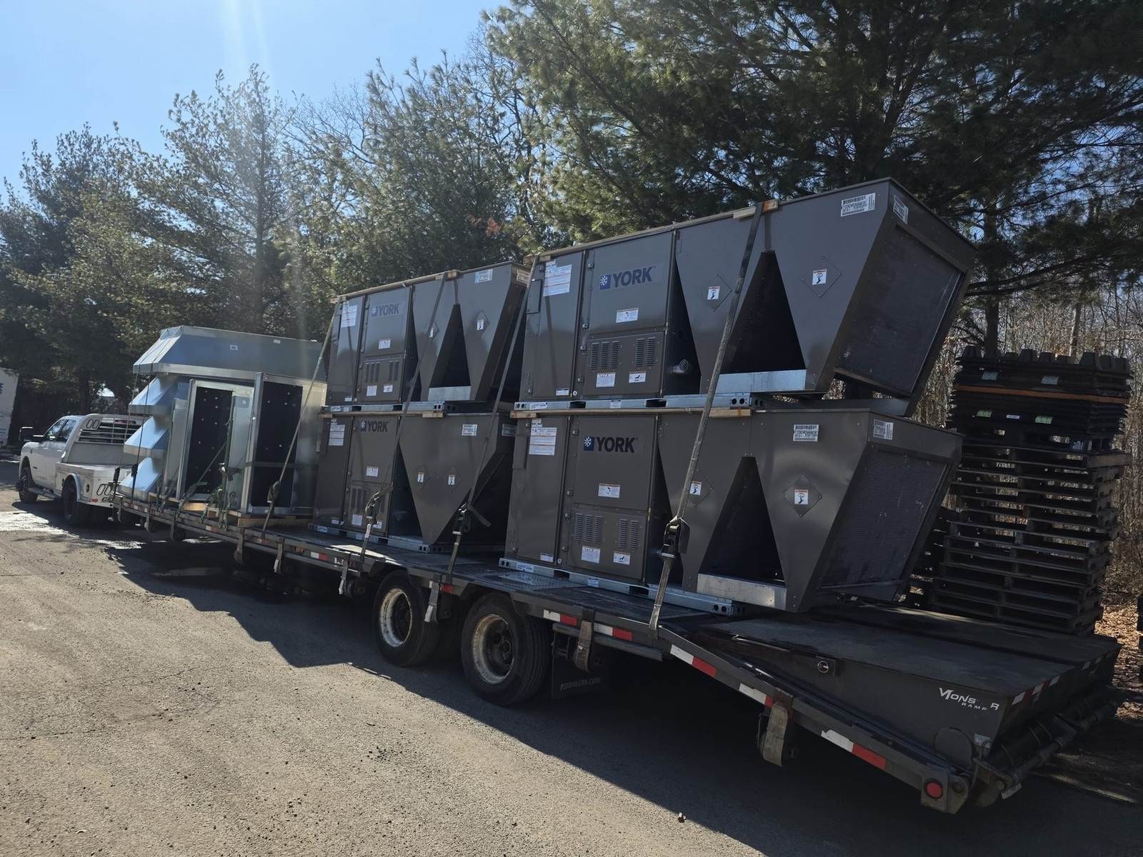 Flatbed of HVAC units staged in the Steedle storage yard