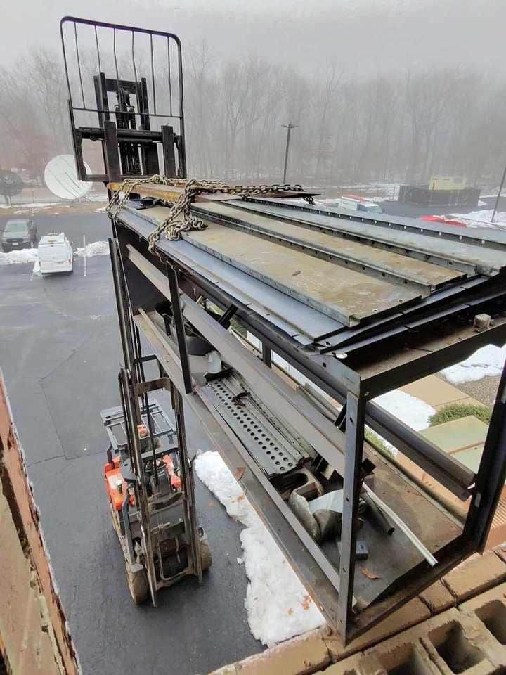Forklift working with containers at the yard